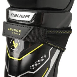 Bauer Supreme Mach Youth Ice Hockey Shin Guards 12 Bauer Supreme Mach Youth Ice Hockey Shin Guards -Hockey Shop MACH YTH strap detail 01